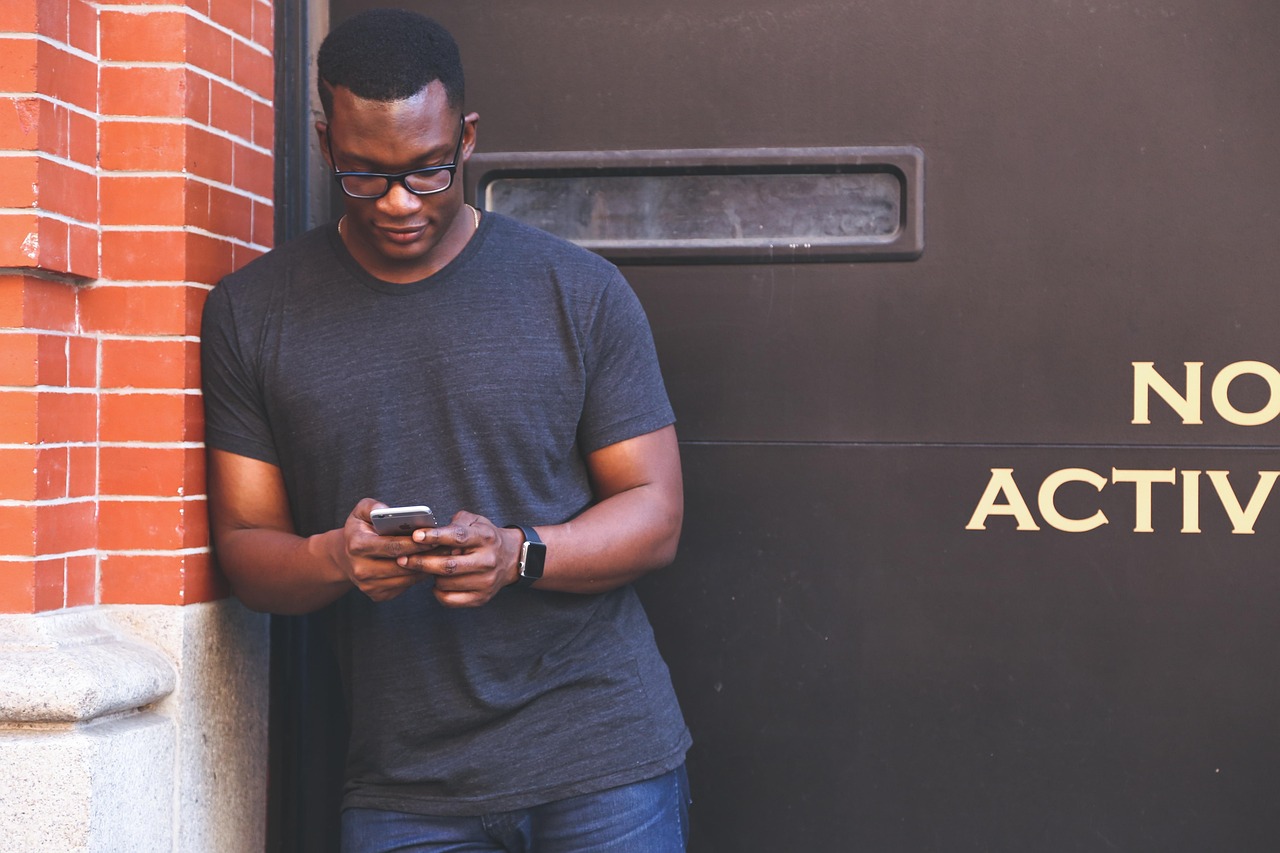 Customer using phone to access garage portal